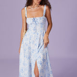 Renata | Midi mėlynas su gėlių raštu, kvadratiniais iškirpimais ir raukšlėmis