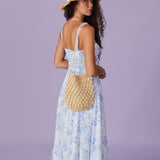 Renata | Midi mėlynas su gėlių raštu, kvadratiniais iškirpimais ir raukšlėmis