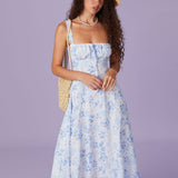 Renata | Midi mėlynas su gėlių raštu, kvadratiniais iškirpimais ir raukšlėmis